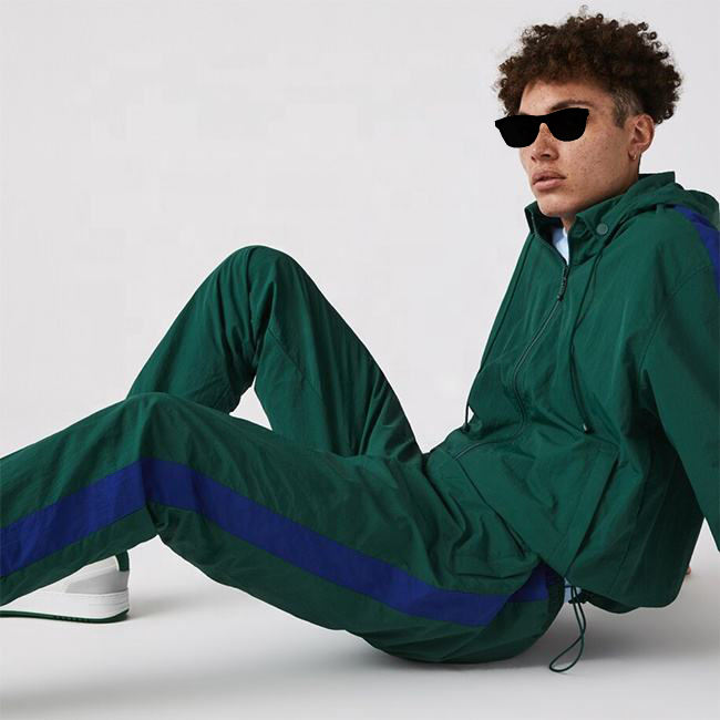 Fabricante y proveedor de trajes para correr con bloques de color de moda personalizados de China Minghang