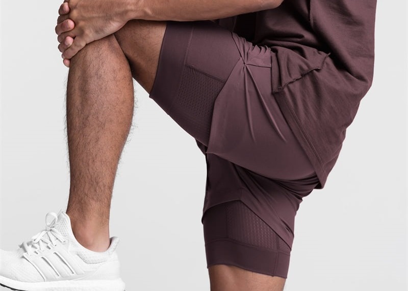 tilpassede atletisk shorts med lommer
