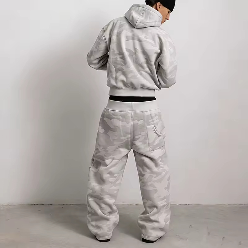 back view of men's grey camo streetwear tracksuit, matching hoodie and baggy pants with camo print
