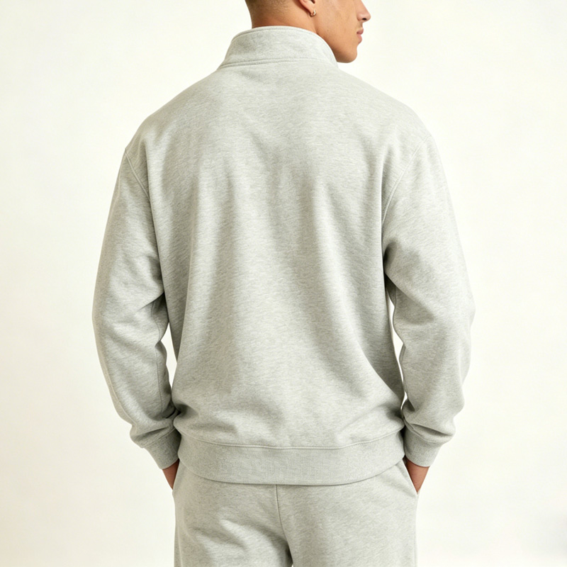 Back view of men's heather gray half-zip sweatshirt, premium fleece fabric for everyday wear