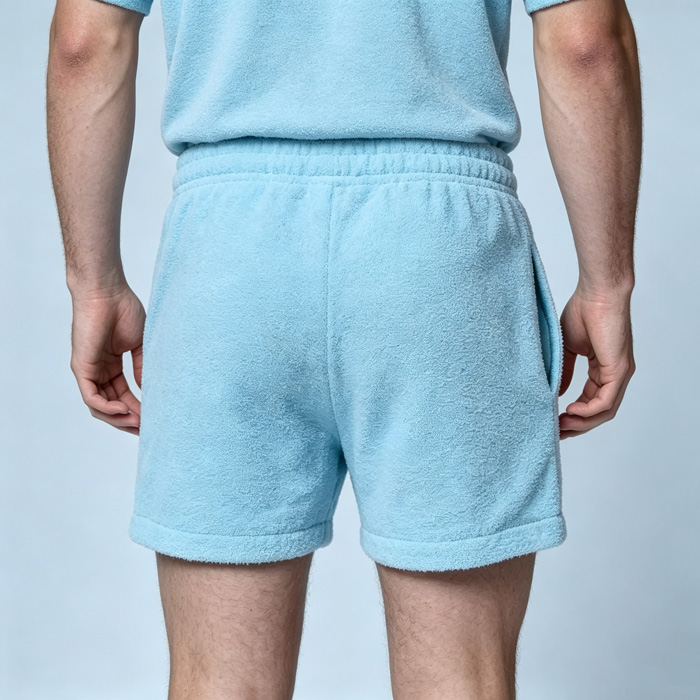 Male model full back view wearing light blue Towel Shorts, oem apparel manufacturer
