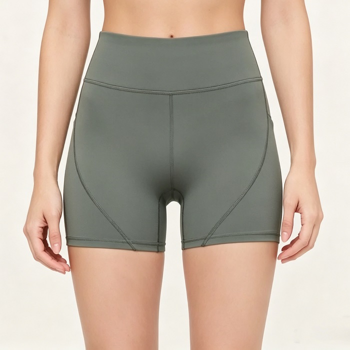 high-waisted biker shorts for women, compression fit with contour stitching, OEM custom activewear for yoga and gym