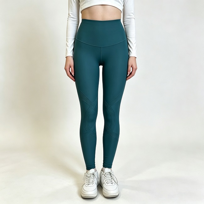 Front view of teal body sculpt leggings with subtle embossed pattern, full-length high-waisted compression leggings, custom private label activewear